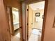 Bathroom with a vanity, toilet, and mirror at 36750 Us 19 N Hwy # 3104, Palm Harbor, FL 34684