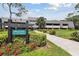 Prestwick Lodge 20 featuring lush landscaping and a well-maintained exterior at 36750 Us 19 N Hwy # 3104, Palm Harbor, FL 34684