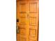 Unit front door with a prominent unit number, and keyless entry system at 36750 Us 19 N Hwy # 3104, Palm Harbor, FL 34684