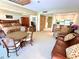 Inviting living space with dining area, plush seating, and an open layout at 36750 Us 19 N Hwy # 3104, Palm Harbor, FL 34684