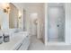 Modern bathroom featuring a glass shower, stylish vanity, and contemporary fixtures for a luxurious feel at 509 Buckingham E Ave, Oldsmar, FL 34677