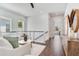 Bright and open loft area with comfortable seating and elegant decor, creating a cozy and inviting space at 509 Buckingham E Ave, Oldsmar, FL 34677