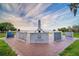 A veterans memorial with views of a peaceful waterfront honors service members in a dignified setting at 509 Buckingham E Ave, Oldsmar, FL 34677