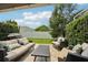 Comfortable outdoor seating arrangement on a brick patio perfect for entertaining or relaxing at 513 Harbor Springs Dr, Palm Harbor, FL 34683