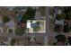 Aerial view showing the property's location surrounded by well-maintained streets and mature trees at 5698 26Th N Ave, St Petersburg, FL 33710