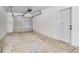 Spacious one car garage with concrete floor and new garage door at 5698 26Th N Ave, St Petersburg, FL 33710