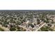 Aerial view of a residential neighborhood with well-maintained homes and mature trees at 5698 26Th N Ave, St Petersburg, FL 33710
