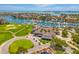 Overhead shot of the country club with pool, golf course, landscaping, and marina on the water at 5964 Bayview S Cir, St Petersburg, FL 33707