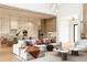 Spacious open-concept living area with a kitchen island and comfortable modern seating at 5964 Bayview S Cir, St Petersburg, FL 33707