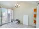 Bright dining area with tiled floor and sliding door access to the backyard at 6118 Kracker Ave, Gibsonton, FL 33534