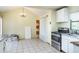 Bright kitchen area with stainless steel appliances conveniently located by storage cabinets at 6118 Kracker Ave, Gibsonton, FL 33534