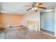 Spacious room with hardwood floors and ceiling fan, ideal for versatile living area design at 6118 Kracker Ave, Gibsonton, FL 33534