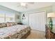 Inviting bedroom with neutral-toned walls, a queen bed, and ample closet space for a restful stay at 616 2Nd St, Indian Rocks Beach, FL 33785