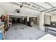Garage with an open floor plan offers ample space for parking and storage at 616 2Nd St, Indian Rocks Beach, FL 33785
