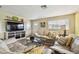 Comfortable living room with a large television and stylish decor at 616 2Nd St, Indian Rocks Beach, FL 33785