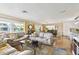 Spacious living room with comfortable seating and plenty of natural light at 616 2Nd St, Indian Rocks Beach, FL 33785