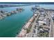 Breathtaking aerial shot showcasing waterfront condos, boat docks, and picturesque Gulf access at 640 Bayway Blvd # 302, Clearwater Beach, FL 33767