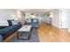 Spacious living area with a comfortable sofa, stylish decor, and lots of natural light at 640 Bayway Blvd # 302, Clearwater Beach, FL 33767