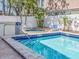 A refreshing pool with a connected jacuzzi offers an inviting space for relaxation and leisure at 640 Bayway Blvd # 302, Clearwater Beach, FL 33767