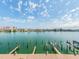 Expansive waterfront view of the bay featuring boat docks and a vibrant cityscape on a sunny day at 640 Bayway Blvd # 302, Clearwater Beach, FL 33767