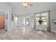 Bright dining area with a modern table set, large windows, and a view of the covered patio at 7201 5Th N Ave, St Petersburg, FL 33710