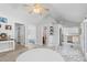 Open-concept living area featuring modern decor, vaulted ceilings, and easy access to kitchen and bedrooms at 7201 5Th N Ave, St Petersburg, FL 33710