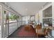 Relaxing porch with seating, string lights, and a view of the surrounding neighborhood at 7201 5Th N Ave, St Petersburg, FL 33710