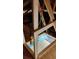 View of the attic lift with easy access to storage items at 8009 Trimbelle Ter, Parrish, FL 34219