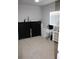 Versatile room with closet and desk, offering space for storage or a functional home office setup at 8009 Trimbelle Ter, Parrish, FL 34219