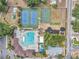Bird's eye view of resort-style community amenities including a pool, playground, tennis and basketball courts at 815 Sandy Trail Pl, Brandon, FL 33511