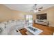 Open living room with sliding glass doors leading to the pool and backyard at 815 Sandy Trail Pl, Brandon, FL 33511