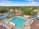 Community pool offers a spacious swimming area and lounge seating with tennis courts and playground nearby at 815 Sandy Trail Pl, Brandon, FL 33511