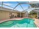 This is a beautiful pool with an attached, screened-in lanai and an attached seating area with a table and chairs at 815 Sandy Trail Pl, Brandon, FL 33511
