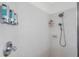 Modern shower with wall-mounted soap dispensers and chrome shower head at 815 Sandy Trail Pl, Brandon, FL 33511