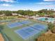 Beautiful community featuring tennis and basketball courts, and a sparkling swimming pool for residents at 815 Sandy Trail Pl, Brandon, FL 33511