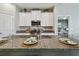 Kitchen with granite countertops and modern appliances at 8772 Flourish Dr, Land O Lakes, FL 34637