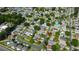 Overhead view of a quaint neighborhood featuring tree-lined streets and well-maintained homes at 8812 Beeler Dr, Tampa, FL 33626