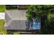 Close aerial view of roof of home, highlighting the roof material, vents, and skylights at 8812 Beeler Dr, Tampa, FL 33626