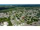 Areal shot of a serene residential area, showcasing lush landscaping and homes in a tranquil setting at 8812 Beeler Dr, Tampa, FL 33626
