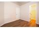 Unfurnished bedroom with neutral paint, wood floors, and a closet; versatile space for customization and design at 8812 Beeler Dr, Tampa, FL 33626