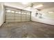 Spacious garage with a large door and installed mirror at 8812 Beeler Dr, Tampa, FL 33626