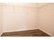 Walk-in closet with wire shelving and wood floors at 8812 Beeler Dr, Tampa, FL 33626