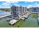 Stunning aerial view showcasing the waterfront condo and private boat slips at 920 N Osceola Ave # 301, Clearwater, FL 33755