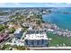 Expansive aerial view of waterfront condos, a marina, and intercoastal waterway in city at 920 N Osceola Ave # 301, Clearwater, FL 33755