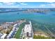 Stunning aerial view of waterfront condos, a marina, and the intercoastal waterway at 920 N Osceola Ave # 301, Clearwater, FL 33755