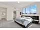 Modern bedroom featuring large windows, a closet and neutral color scheme at 920 N Osceola Ave # 301, Clearwater, FL 33755