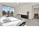 Bright bedroom featuring balcony access, modern furniture and neutral color scheme at 920 N Osceola Ave # 301, Clearwater, FL 33755