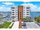 Modern condo building showcasing contemporary design, balconies, and waterfront views at 920 N Osceola Ave # 301, Clearwater, FL 33755