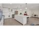 Modern kitchen featuring a large island with pendant lighting and stainless appliances at 920 N Osceola Ave # 301, Clearwater, FL 33755