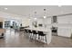 Spacious kitchen with a large island, stainless steel appliances, and open to living area at 920 N Osceola Ave # 301, Clearwater, FL 33755
